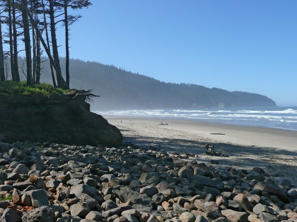 Image of guided meditation at Pebble beach, video blog, vlog, blog to video, video presentation, Sandy beach